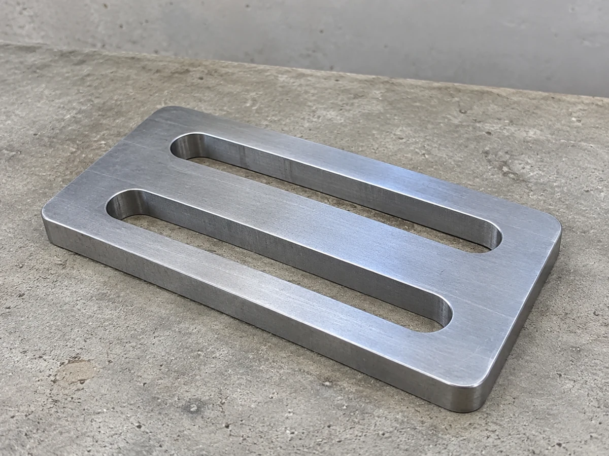 Blue-passivated steel support plate — representative component illustration