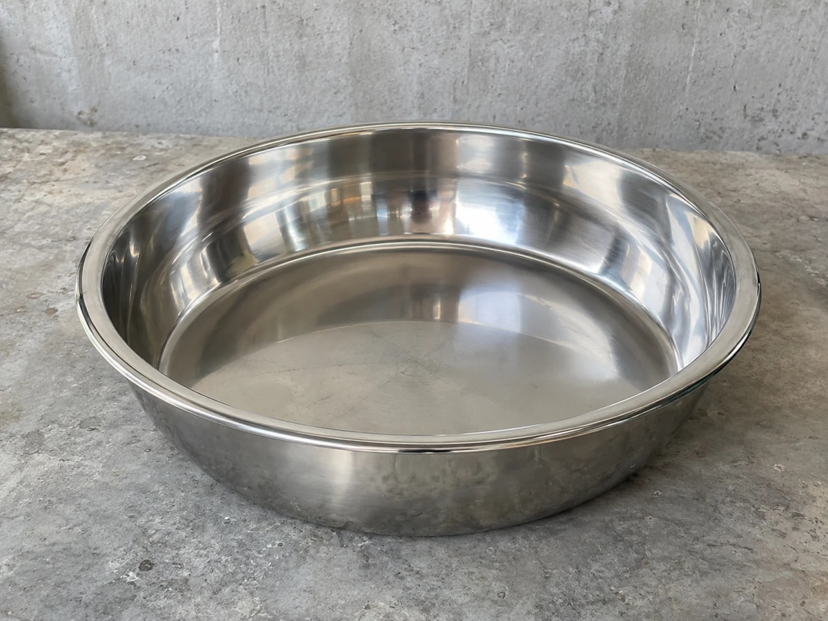 Buffed stainless formed dish — representative component illustration