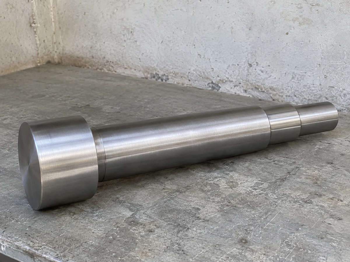Precision-ground stepped spindle — representative component illustration