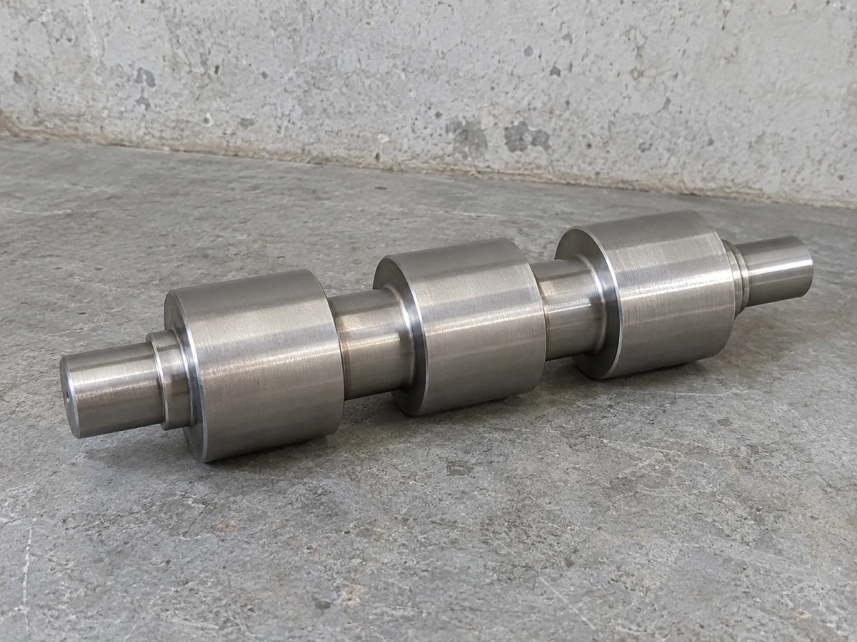 Electroless nickel hydraulic valve spool — representative component illustration