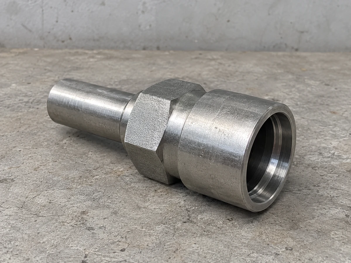 Zinc-nickel hydraulic fitting blank — representative component illustration